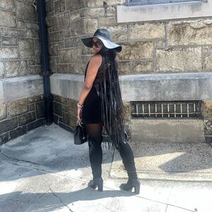 Chic Black Dress with Wide-Brim Hat